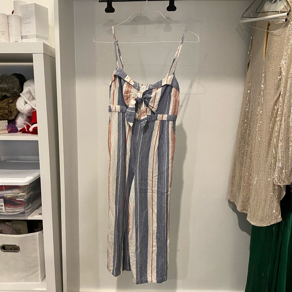 Pin stripe jumpsuit with front peep hole
